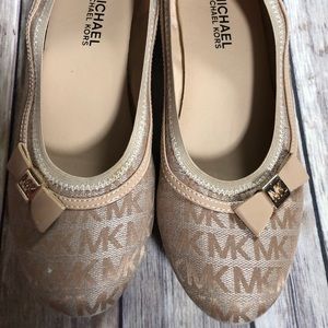 Michael Kors juniors shoe size 5.